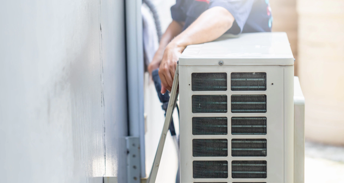 technician doing hvac maintenance